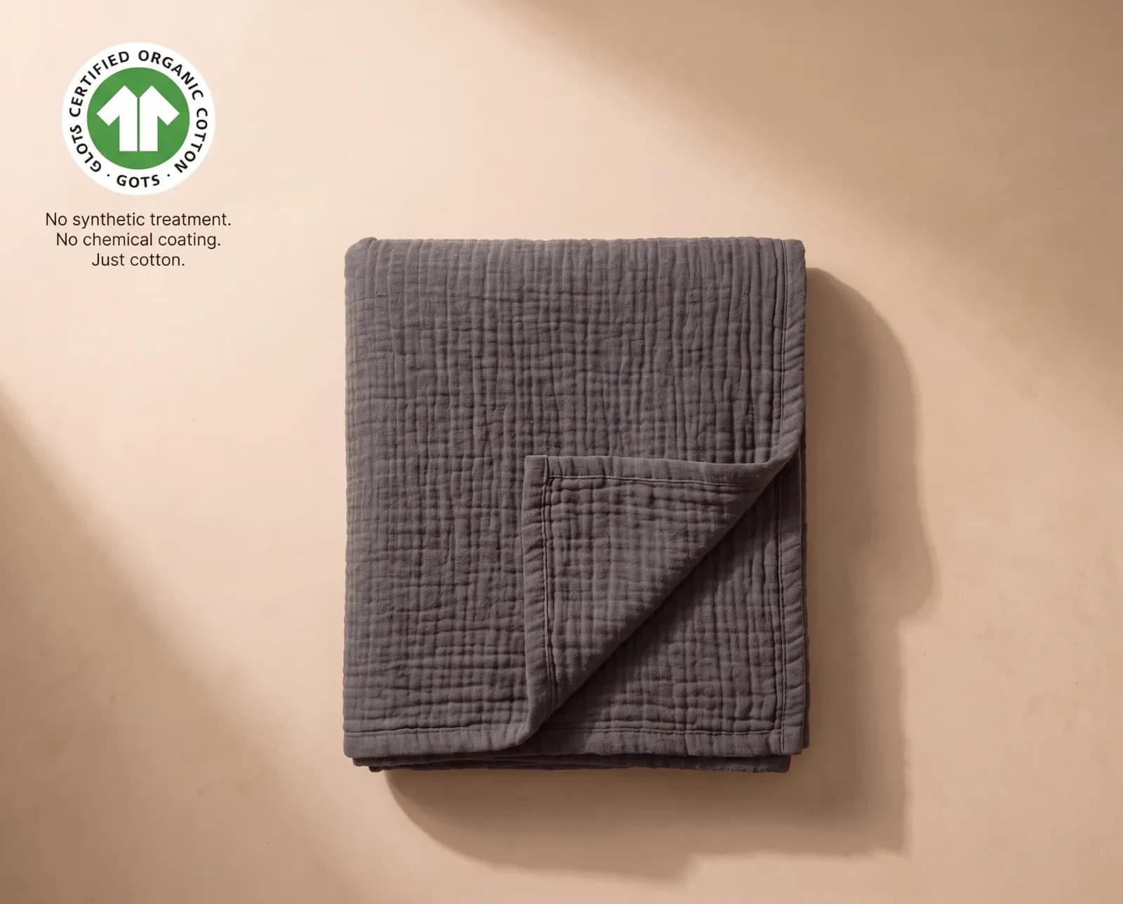 Folded firth muslin cotton blanket showing organic cotton texture